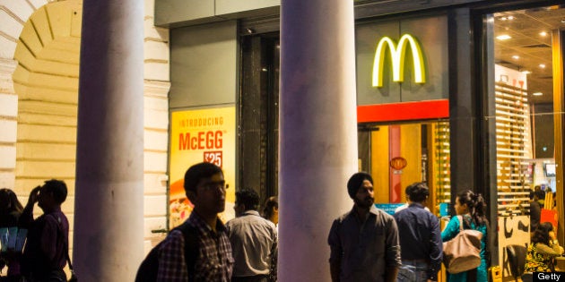 DELHI, INDIA - DECEMBER 01: McDonalds fast food restaurat at Connaught Place, a luxury shopping area in the city centre of New Delhi on December 01, 2012 in Delhi, Delhi, India. (Photo by EyesWideOpen/Getty Images)