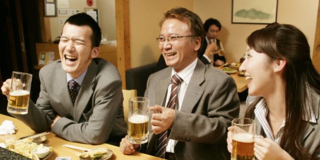 Man and woman chatting in the Japanese-style pub