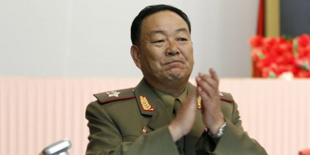 Vice Marshal Hyon Yong Chol applauds during a meeting at the April 25 House of Culture announcing North Korean leader Kim Jong Un's new title of marshal, Wednesday, July 18, 2012, in Pyongyang, North Korea. The decision to award the top title to Kim, who already serves as supreme commander of the Korean Peopleâs Army, was made Tuesday by the nationâs military, government and political leadership, state media said in a special bulletin. The move solidifying his standing comes seven months into Kimâs rule. (AP Photo/Jon Chol Jin)