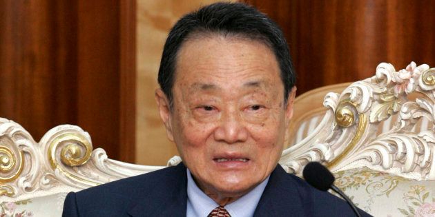 Malaysian tycoon Robert Kuok attends a meeting in Fuzhou, Fujian province, in this April, 18, 2005 file photo. Picture taken April 18, 2005. REUTERS/China Daily (CHINA - Tags: BUSINESS POLITICS) CHINA OUT. NO COMMERCIAL OR EDITORIAL SALES IN CHINA