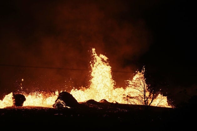 KAPOHO, HI - MAY 18: New cones are formed (LOWER L) as lava erupts from a Kilauea volcano fissure on Hawaii's Big Island on May 18, 2018 in Kapoho, Hawaii. The U.S. Geological Survey said the volcano erupted explosively on May 17 launching a plume about 30,000 feet into the sky. (Photo by Mario Tama/Getty Images)