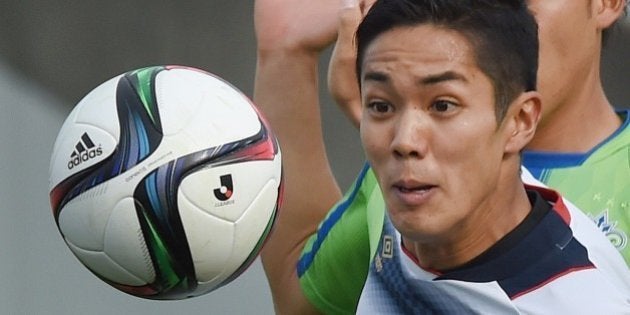 FC Tokyo forward Yoshinori Muto eyes the ball during a J-League football match against Shonan Bellmare in Hiratsuka, Kanagawa prefecture, on April 12, 2015. English Premier League leaders Chelsea have made a formal offer for the 22-year-old Japanese striker Muto, his club FC Tokyo said recently. AFP PHOTO / Toru YAMANAKA (Photo credit should read TORU YAMANAKA/AFP/Getty Images)