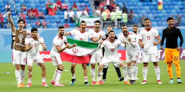 Soccer Football - World Cup - Group B - Morocco vs Iran - Saint Petersburg Stadium, Saint Petersburg, Russia - June 15, 2018 Iran players celebrate after the match REUTERS/Henry Romero