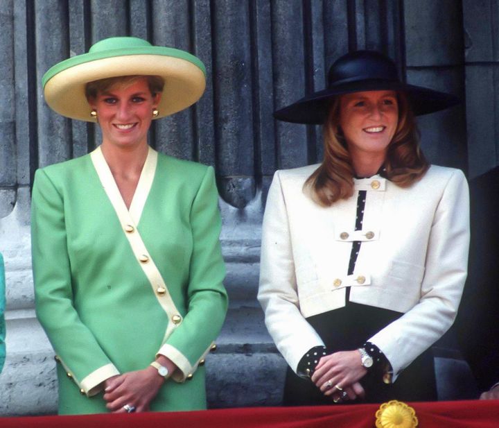 Diana, Princess of Wales, and Sarah, Duchess of York, attend the 50th Anniversary of The Battle of Britain Parade from the balcony of Buckingham Palace in 1990.