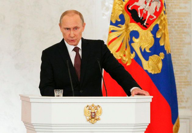 クリミアをロシアに編入する方針を宣言するプーチン大統領＝2014年3月、モスクワ・クレムリン