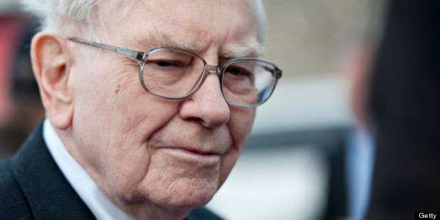 Warren Buffett, chairman and chief executive officer of Berkshire Hathaway Inc., listens while speaking to members of the media outside the Bridge Center in Omaha, Nebraska, U.S., on Thursday, May 2, 2013. Buffett said his eventual successor would probably be paid more than him to run the company. Photographer: Daniel Acker/Bloomberg via Getty Images