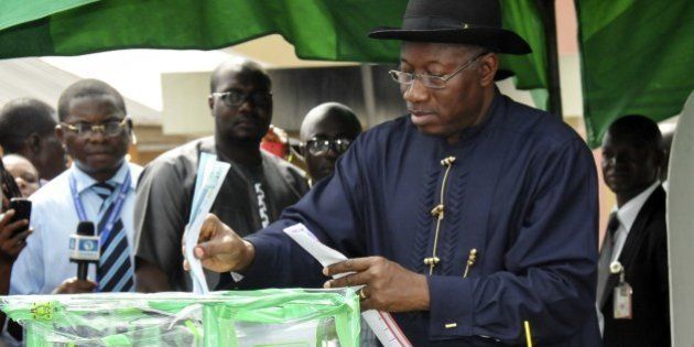 Nigerian President Goodluck Jonathan casts his ballot in Otuoke on March 28, 2015. Voting began in Nigeria's general election but delays were reported countrywide because of technical problems in accrediting electors. There was a mixed picture across the country, with people at some polling units reporting no problems in casting their ballot from 1230 GMT but others still waiting for their identities to be checked.AFP PHOTO/STRINGER (Photo credit should read STRINGER/AFP/Getty Images)