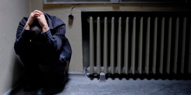 Man with deep depression in the corner of a