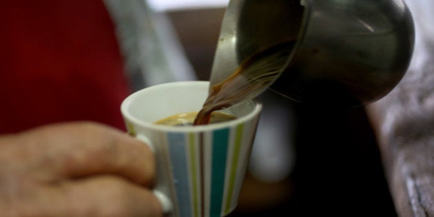 MIAMI, FL - MARCH 10: An expresso coffee is prepared for a customer at the Los Pinarenos Fruteria on March 10, 2015 in Miami, Florida. A panel of government-appointed scientists at the Dietary Guidelines Advisory Committee charged with proposing changes to U.S. dietary guidelines announced recently that three to five cups of coffee daily do not have long-term health risks, and help reduce the risk for heart disease and type 2 diabetes. (Photo by Joe Raedle/Getty Images)