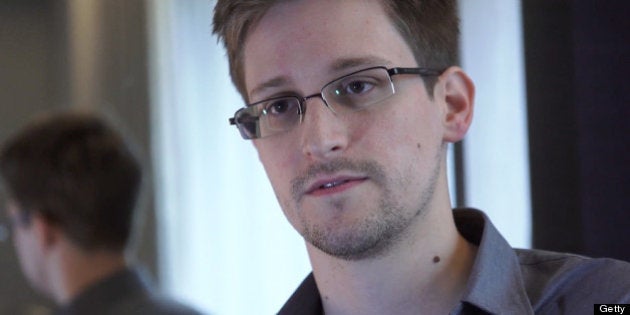 HONG KONG - 2013: In this handout photo provided by The Guardian, Edward Snowden speaks during an interview in Hong Kong. Snowden, a 29-year-old former technical assistant for the CIA, revealed details of top-secret surveillance conducted by the United States' National Security Agency regarding telecom data. (Photo by The Guardian via Getty Images)