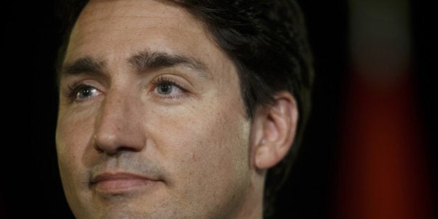 Justin Trudeau, Canada's prime minister, listens during a news conference following a town hall event in Kingston, Ontario, Canada, on Thursday, Jan. 12, 2017. Trudeau confirmed that his senior advisers have met with U.S. President-elect Donald Trump's officials. Photographer: Cole Burston/Bloomberg via Getty Images