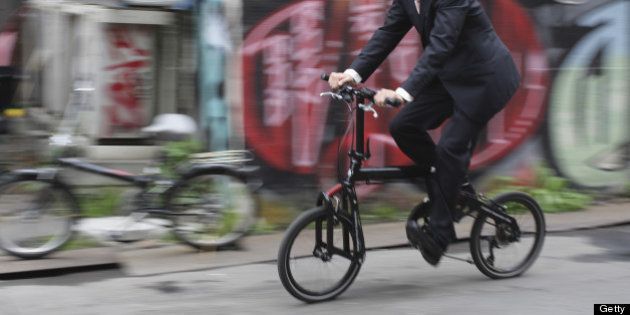 Businessman Riding Bike