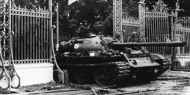 SAIGON, VIET NAM: VIETNAM OUT TO GO WITH 'VIETNAM-US-WAR-ANNIVERSARY' (FILES) This 30 April 1975 file photo shows a North Vietnamese communist tank driving through the main gate of the presidential palace of the US-backed South Vietnam regime as the city falls into the hands of communist troops. Vietnam will celebrate 30 April 2005 the 30th anniversary of the fall of Saigon, since renamed Ho Chi Minh City, a defining moment that sealed the catastrophic failure of US policy in Indo-China and cemented the communist victory in the long war. VIETNAM OUT AFP PHOTO/VNA/FILES (Photo credit should read AFP/AFP/Getty Images)