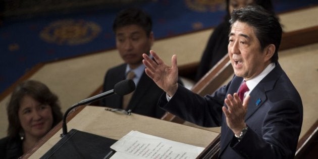 Japanese Prime Minister Shinzo Abe addresses a joint session of Congress at the US Capitol in Washington,...