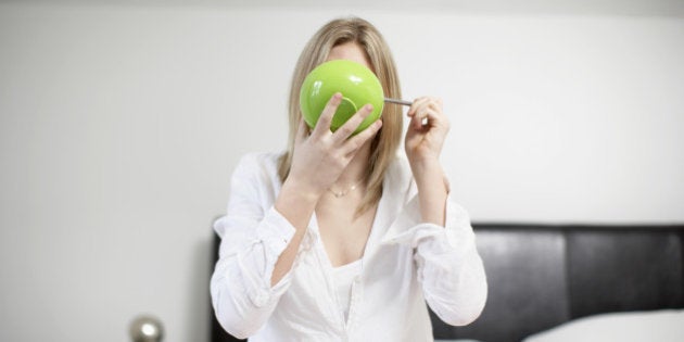 Woman eating bowl of cereal