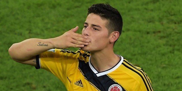 Colombia's midfielder James Rodriguez celebrate after the Round of 16 football match between Colombia and Uruguay at the Maracana Stadium in Rio de Janeiro during the 2014 FIFA World Cup in Brazil on June 28, 2014. AFP PHOTO / GABRIEL BOUYS (Photo credit should read GABRIEL BOUYS/AFP/Getty Images)