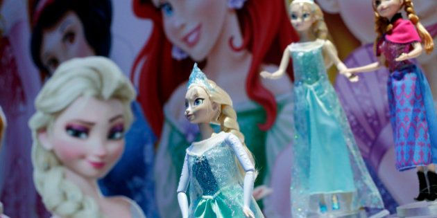 Disney Frozen Feature Fashion Dolls are displayed at the Mattel booth, Friday, Feb. 14, 2014 at the American International Toy Fair in New York. (AP Photo/Mark Lennihan)
