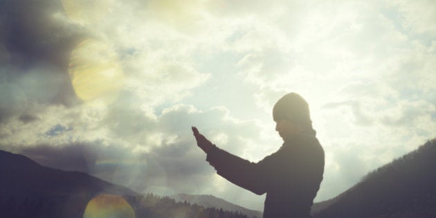 woman praying, tranquil scene, freedom concepts.