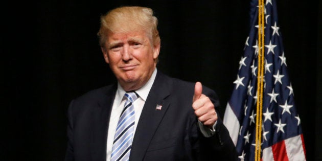 Republican presidential candidate Donald Trump acknowledges the crowd after giving an energy speech at the Williston Basin Petroleum Conference, Thursday, May 26, 2016, in Bismarck, N.D. (AP Photo/Charles Rex Arbogast)