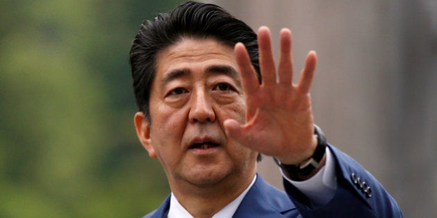 Japan's Prime Minister Shinzo Abe visits the Ise Grand Shrine, the holiest site in Japan's Shinto religion, in Ise, Japan, May 25, 2016. REUTERS/Toru Hanai