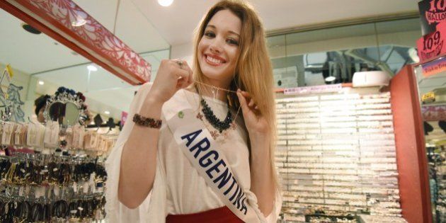 Miss International contestant, Miss Argentine Helena Zuiani visits the Shibuya 109 shopping mall in Tokyo on October 23, 2015. The Miss International beauty pageant 2015, with representatives from 70 countries and regions will be held in Tokyo on November 5. AFP PHOTO / Toru YAMANAKA (Photo credit should read TORU YAMANAKA/AFP/Getty Images)