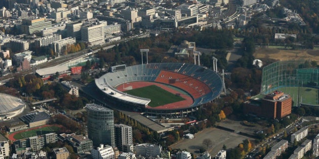 The National Olympic Stadium, center, stands in this aerial photograph taken in Tokyo, Japan, on Monday, Dec. 2, 2013. Japan's gross domestic product rose an annualized 1.9 percent in the July-September period after gaining 3.8 percent the previous quarter, the Cabinet Office reported on Nov. 14. Photographer: Tomohiro Ohsumi/Bloomberg via Getty Images