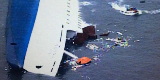 JINDO-GUN, SOUTH KOREA - APRIL 16: In this screen shot handout of helicopter camera provided by the Republic of Korea Coat Guard, the ferry is seen sinking off as the rescue work continues the coast of Jindo Island on April 16, 2014 in Jindo-gun, South Korea. Two people are dead, and more than ninety are missing as reported. The ferry identified as the Sewol was carrying about 470 passengers, including the students and teachers, traveling to Jeju island. (Photo by The Republic of Korea Coast Guard via Getty Images)
