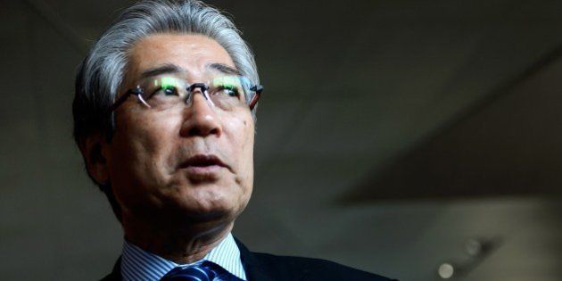 Japanese Olympic Committee (JOC) President Tsunekazu Takeda answers to journalists after a meeting on December 10, 2013 at International Olympic Committee (IOC) headquarters in Lausanne. AFP PHOTO / FABRICE COFFRINI (Photo credit should read FABRICE COFFRINI/AFP/Getty Images)