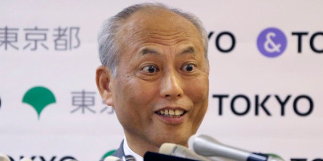 Tokyo Gov. Yoichi Masuzoe answers reporters questions during a press conference in Tokyo, Friday, May 13, 2016. The governor Tokyo has triggered public outrage for flying first-class and staying at up to $1,800-a-night suites in Europe and America during official overseas trips. (AP Photo/Koji Sasahara)