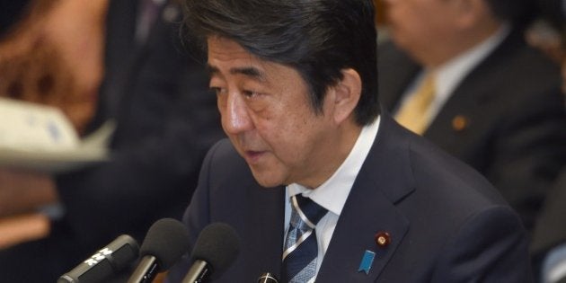 Japanese Prime Minister Shinzo Abe answers questions at parliament in Tokyo on January 29, 2015. Japan has asked Jordan for help after the Islamic State jihadist group threatened to kill Japanese hostage Kenji Goto and a Jordanian pilot unless Amman frees a jailed female militant AFP PHOTO / Toru YAMANAKA (Photo credit should read TORU YAMANAKA/AFP/Getty Images)