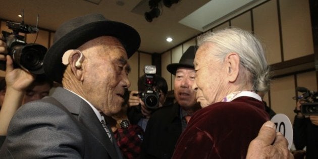 South Korean Lee Soon-kyu, 85, right, meets with her North Korean husband Oh Se In, 83, during the Separated Family Reunion Meeting at Diamond Mountain resort in North Korea, Tuesday, Oct. 20, 2015. Hundreds of elderly Koreans from divided North and South began three days of reunions Tuesday with loved ones many have had no contact with since the war between the countries more than 60 years ago.(Korea Pool via AP) KOREA OUT