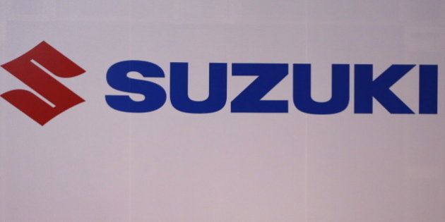 The logo of Suzuki Motors is displayed at the 44th Tokyo Motor Show in Tokyo, Japan, November 2, 2015. REUTERS/Issei Kato