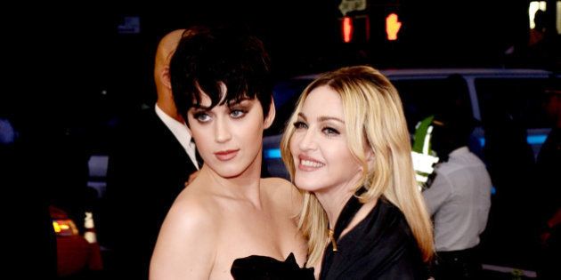 Katy Perry, left, and Madonna arrive at The Metropolitan Museum of Art's Costume Institute benefit gala celebrating