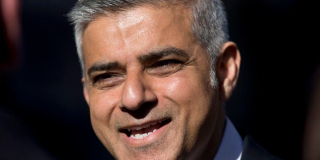 Labour party candidate for Mayor of London Sadiq Khan gives a television interview during a campaign event to highlight the choices Londoners face at the London mayoral elections, in the Canary Wharf business district at London, Wednesday, May 4, 2016. The London mayoral elections take place on Thursday. (AP Photo/Matt Dunham)