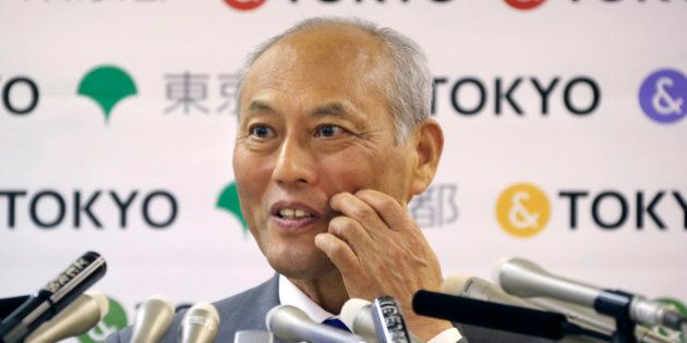 Tokyo Gov. Yoichi Masuzoe answers reporters questions during a press conference in Tokyo, Friday, May 13, 2016. The governor Tokyo has triggered public outrage for flying first-class and staying at up to $1,800-a-night suites in Europe and America during official overseas trips. (AP Photo/Koji Sasahara)