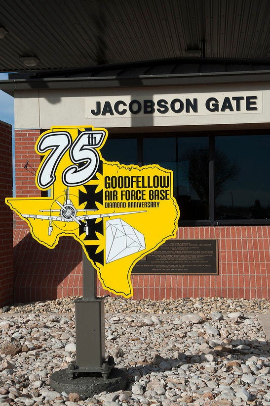 An Anniversary sign stands outside the Jacobson Gate on Goodfellow Air Force Base, Texas in 2016. 