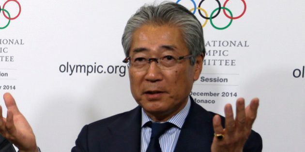 Japan's IOC member Tsunekazu Takeda, speaks, during a press conference at the 127th International Olympic Committee session in Monaco, Monday, Dec. 8, 2014. (AP Photo/Lionel Cironneau)