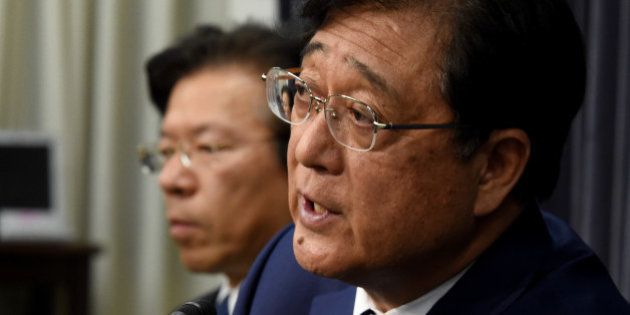 Mitsubishi Motors Chairman and CEO Osamu Masuko speaks beside the company's president and COO Tetsuro Aikawa (L) during a press conference at the transport ministry in Tokyo on May 11, 2016. Mitsubishi Motors cheated on fuel-efficiency testing for almost every model it sold in Japan in the last 25 years, a report said on May 11, fuelling questions about the size of a scandal that has plunged the automaker into crisis. / AFP / TOSHIFUMI KITAMURA (Photo credit should read TOSHIFUMI KITAMURA/AFP/Getty Images)