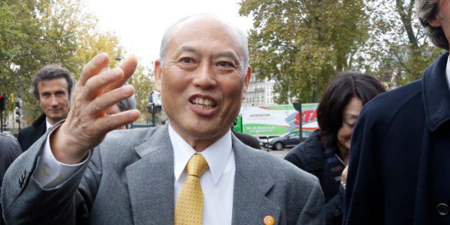 Tokyo mayor Yoichi Masuzoe arrives with Jean-Charles Decaux, Co-Chief Executive Officer of the outdoor advertising company Decaux Group, at the Paris townhall, Wednesday, Oct.28, 2015. Paris and Tokyo later signed a friendships agreement. (AP Photo/Jacques Brinon)