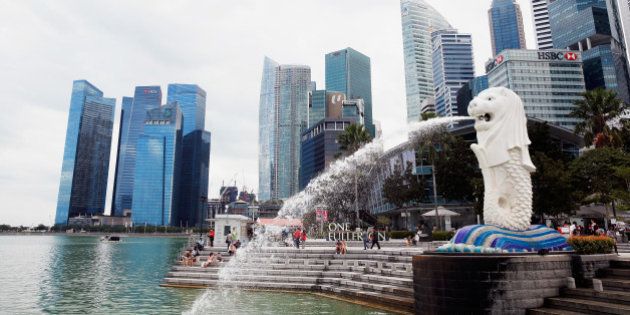 SINGAPORE - MARCH 09: A view of the Merlion and the Singapore financial district near the Singapore River on March 9, 2015 in Singapore. (Photo by Scott Halleran/Getty Images)