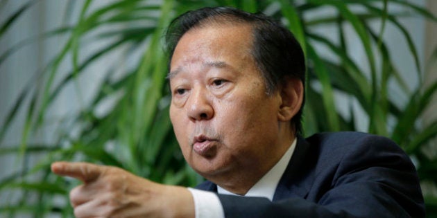 Toshihiro Nikai, chairman of the general council at the Liberal Democratic Party (LDP), gestures as he speaks during an interview in Tokyo, Japan, on Monday, June 8, 2015. The Bank of Japan should carefully watch the economy to decide on easing, the former trade minister said in an interview. Photographer: Kiyoshi Ota/Bloomberg via Getty Images