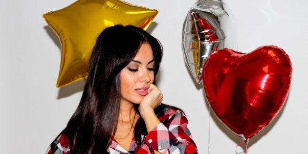 Beutiful Young Fashion Woman with helium ballons on white background