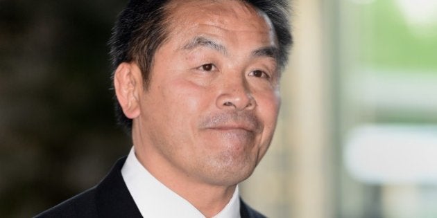 Newly appointed Japanese Education, Culture, Sports and Science Minister Hiroshi Hase enters the prime minster's official residence in Tokyo on October 7, 2015. A former wrestler and television anchorwoman were expected to become part of Japan's Cabinet on October 7, as part of a reshuffle by Prime Minister Shinzo Abe expected to keep most major portfolios the same. AFP PHOTO / TOSHIFUMI KITAMURA (Photo credit should read TOSHIFUMI KITAMURA/AFP/Getty Images)