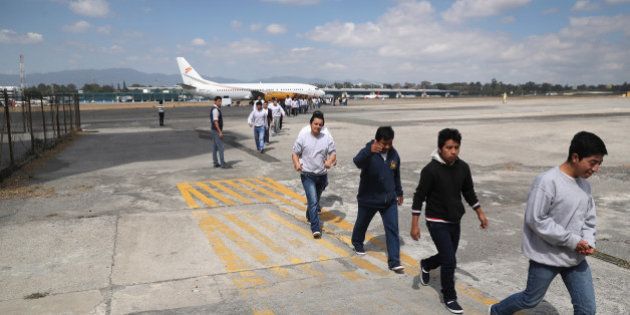 GUATEMALA CITY, GUATEMALA - FEBRUARY 09: Guatemalan immigrants deported from the United States arrive on a ICE deportation flight on February 9, 2017 in Guatemala City, Guatemala. The charter jet, carrying 135 deportees, arrived from Texas, where U.S. border agents catch the largest number illigal immigrants crossing into the United States, many of them from Central America. U.S. President Donald Trump pledged to vastly increase the number of deportations. (Photo by John Moore/Getty Images)