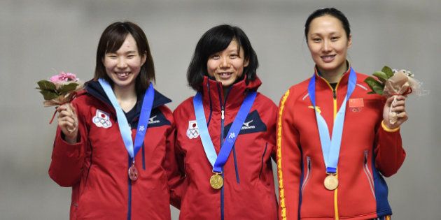 SAPPORO, JAPAN - FEBRUARY 21: (L-R) Misaki Oshigiri of Japan (silver), Miho Takagi of Japan (gold) and Hong Zhang of China (bronze) pose on the podium during medal ceremony for the Speed Skating ladies 1500m on the day four of the 2017 Sapporo Asian Winter Games at Obihiro speed skating oval on February 21, 2017 in Obihiro, Japan. (Photo by Atsushi Tomura/Getty Images)