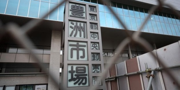 A signboard of the Fish Wholesale Market in Tokyo's Toyosu area is displayed at an entrance to the new facility on January 14, 2017. High levels of toxic chemicals were found in groundwater tests at a new facility scheduled to replace Tokyo's Tsukiji fish market -- the world's largest -- clouding the costly relocation plan, news reports said on January 14. / AFP / Kazuhiro NOGI (Photo credit should read KAZUHIRO NOGI/AFP/Getty Images)