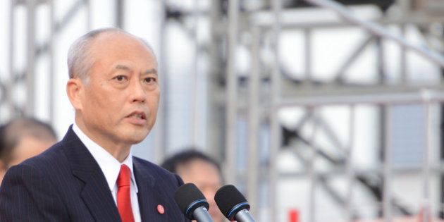 TOKYO, JAPAN - JANUARY 06: Governor of Tokyo, Yoichi Masuzoe speaks during the New Year's fire drill at the Tokyo Big Sight on January 6, 2016 in Tokyo, Japan. According to the Tokyo Fire Department, more than 2000 firefighters and volunteers, and 157 firefighting vehicles (including 5 helicopters and 8 boats) participated in this annual drill, where the participants demonstrated the traditional ladder stunts and the latest rescue/ firefighting techniques. (Photo by Takashi Aoyama/Getty Images)