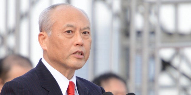 TOKYO, JAPAN - JANUARY 06: Governor of Tokyo, Yoichi Masuzoe speaks during the New Year's fire drill at the Tokyo Big Sight on January 6, 2016 in Tokyo, Japan. According to the Tokyo Fire Department, more than 2000 firefighters and volunteers, and 157 firefighting vehicles (including 5 helicopters and 8 boats) participated in this annual drill, where the participants demonstrated the traditional ladder stunts and the latest rescue/ firefighting techniques. (Photo by Takashi Aoyama/Getty Images)