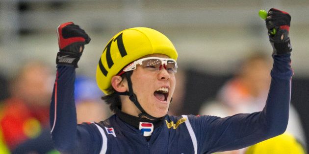 Jinkyu Noh of Korea celebrates after winning the men's 5000 m relay final race of the ISU World Cup short track speed skating event in Dresden, eastern Germany, on February 10, 2013. AFP PHOTO / ROBERT MICHAEL (Photo credit should read ROBERT MICHAEL/AFP/Getty Images)