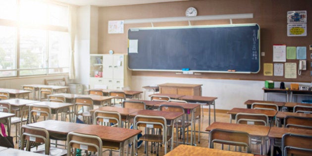 Sun shining on an empty Japanese classroom.